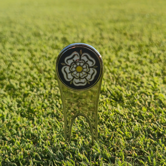 Golf divot repair tool with detachable Yorkshire Rose ball marker